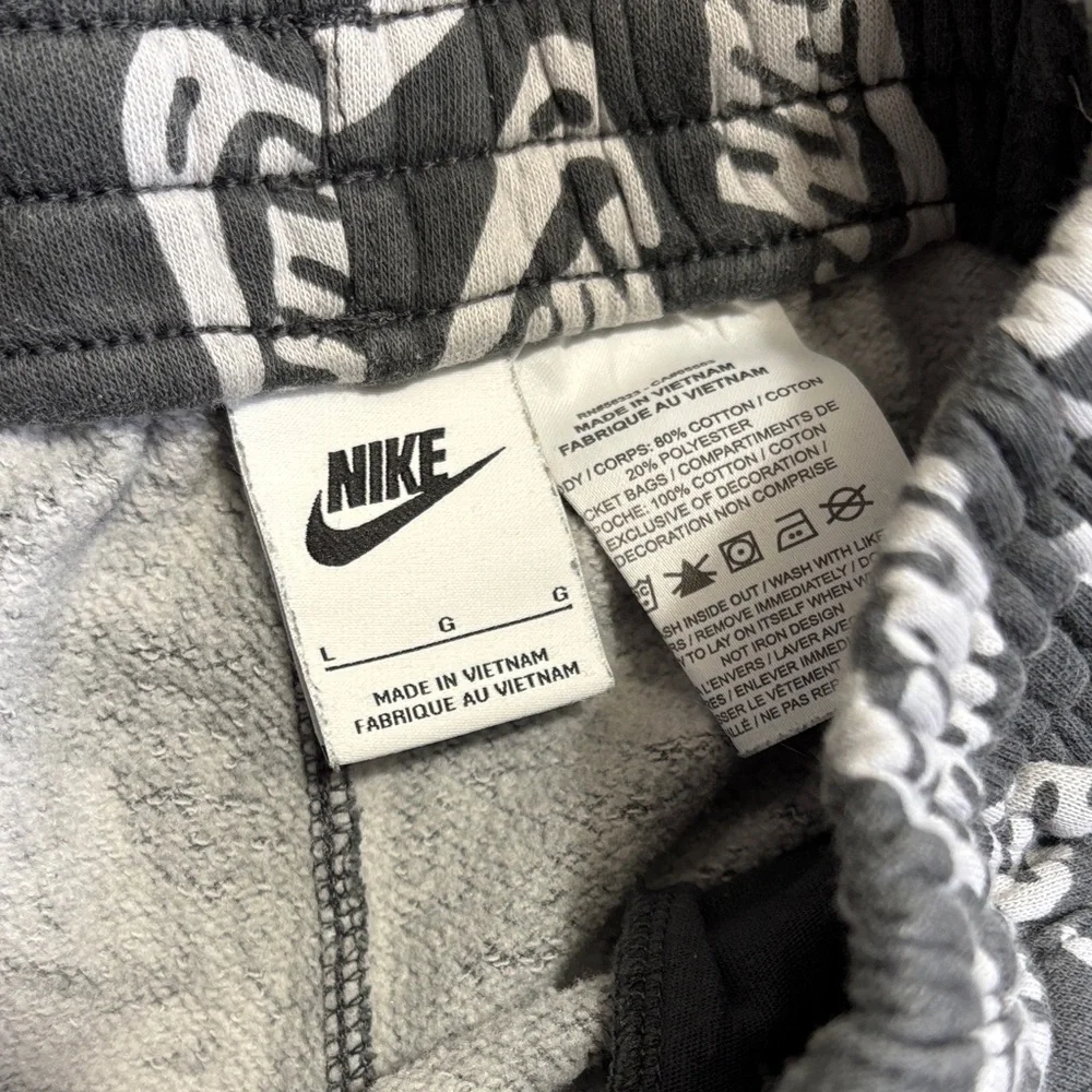 Nike Club Black Jogger Pants with White Logo Print and Neon Green Drawstring